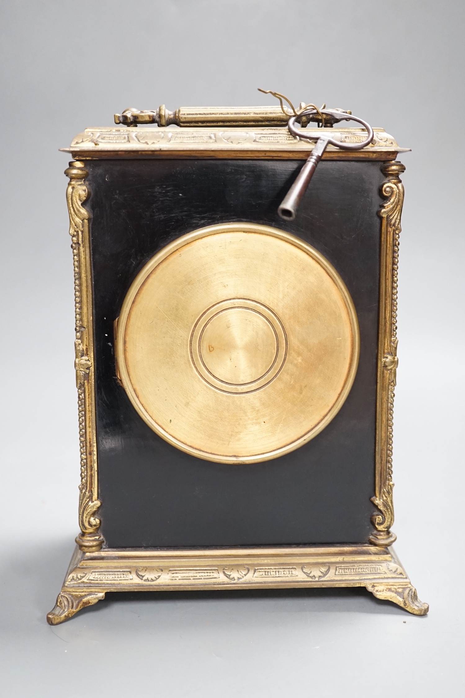 A 19th century brass and ebonised mantel clock